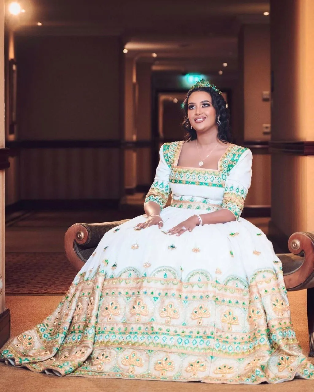 Enchanting Elegant Habesha Kemis Beaded Habesha Wedding Dress with Stunning Green and Multicolor Designs
